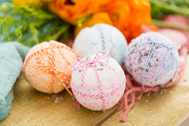 colourful bath bombs tied with string.
